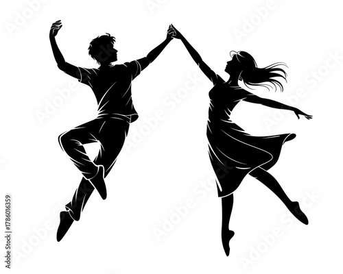 Silhouettes of a man and woman dancing together in mid air