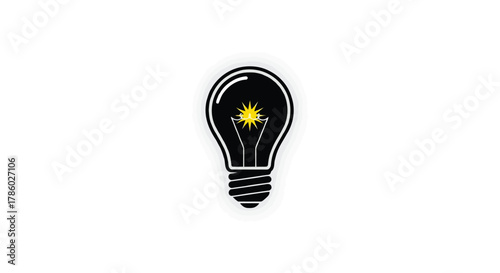 A stylized black light bulb with a bright yellow starburst illuminating from its filament symbolizing a new idea or inspiration