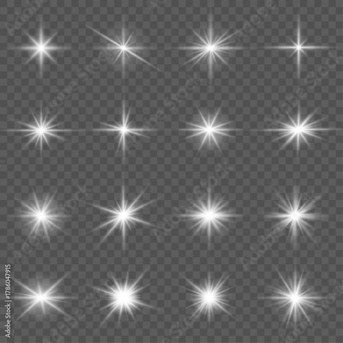 Transparent sunlight beams pierce through the darkness, casting bright flares. Tiny stars and sparkles scatter in all directions. Perfect for magical or festive backgrounds.
