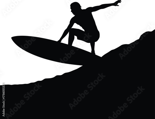 Black silhouette of surfer riding a wave surfing ocean