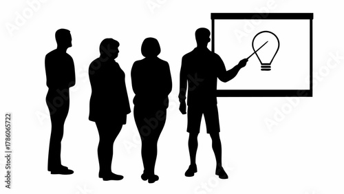 Silhouette of a man presenting a lightbulb on a board to a group of three people in black and white