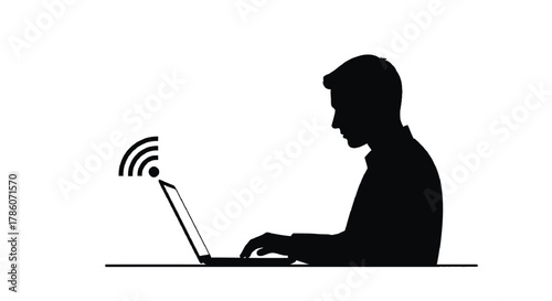 Silhouette of a man working on a laptop with a wi fi signal emanating from the screen representing connectivity and technology