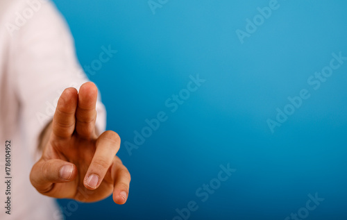 Hand reaching forward with ...