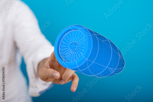A hand interacts with a blu...