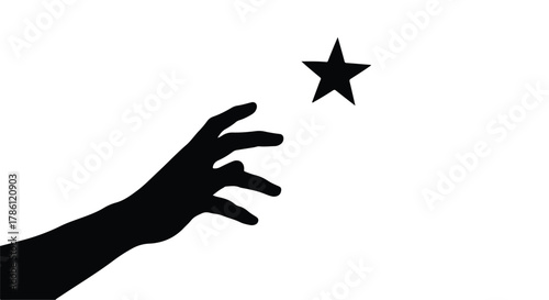 Silhouette of a hand reaching for a star, symbolizing aspiration and dreams.