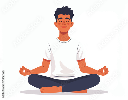 A young man sits in a meditative pose, eyes closed, radiating peace and tranquility.