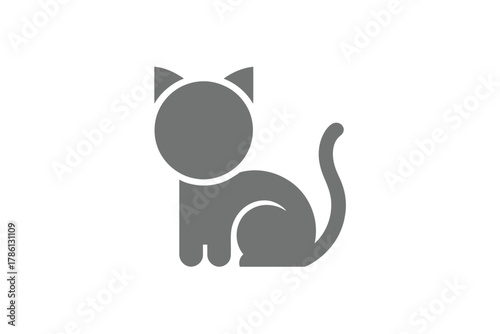 A simple grey silhouette of a cat sits patiently against a white background.