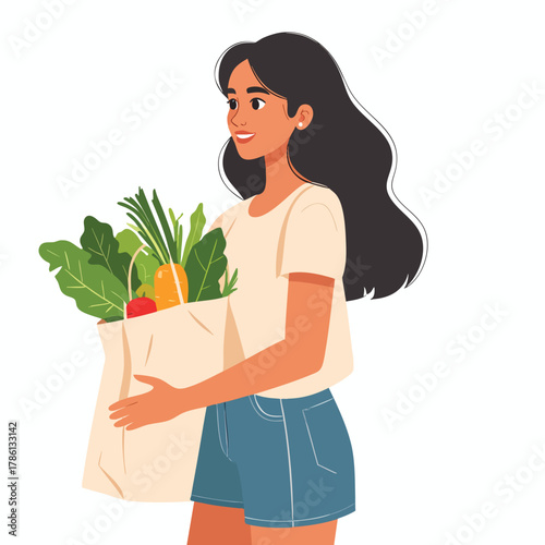 Smiling woman holding a reusable grocery bag filled with fresh produce, looking to the side.