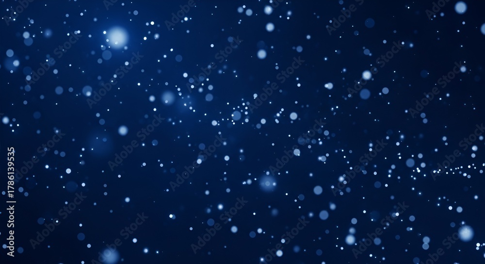 Fototapeta premium Elegant blue bokeh background with sparkling particles for festive designs