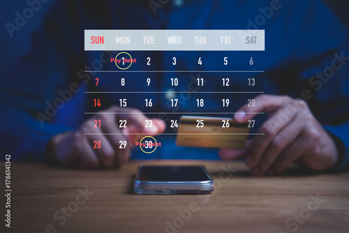 Financial planning concept showing person holding credit card with digital calendar marked Pay debt, symbolizing bill payment reminders, debt management, and personal finance scheduling.