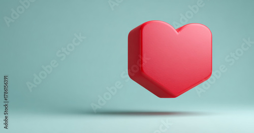 Free Download A three-dimensional, red heart-shaped object is floating against a teal background with soft shadows on the ground below it. - GFXLoad