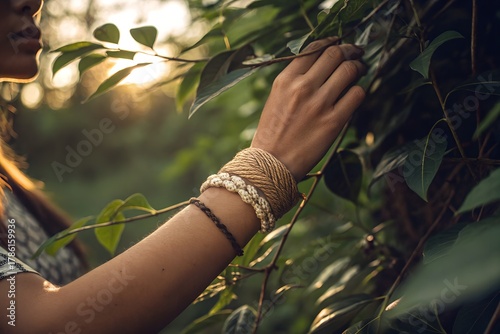 Green leaves emerge from the earth bathed in gentle sunlight. Delicate plants reach upwards toward the bright sky. Fresh growth unfolds in a natural, soft light.