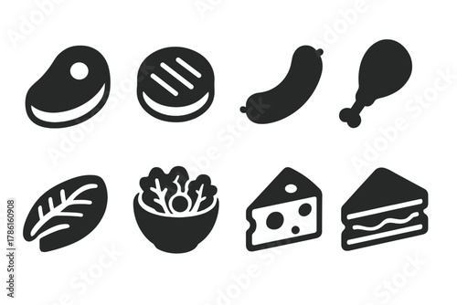 Solid Food Icons. Solid style icons of food products: steak, burger patty, sausage, chicken leg, fish fillet, salad bowl, cheese