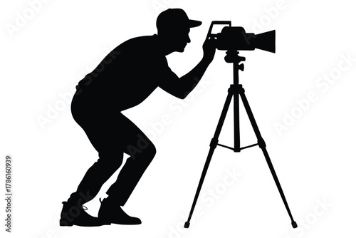 man taking photo using tripod black and white silhouette