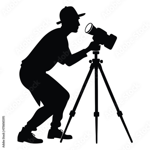 man taking photo using tripod black and white silhouette
