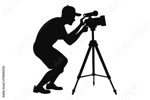 man-taking-photo-using-tripod-black-and-white-silhouette