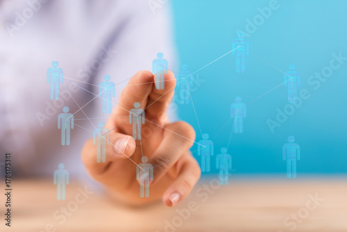 Фототапет Hand interacting with digital human network, representing teamwork, communication, and global connection