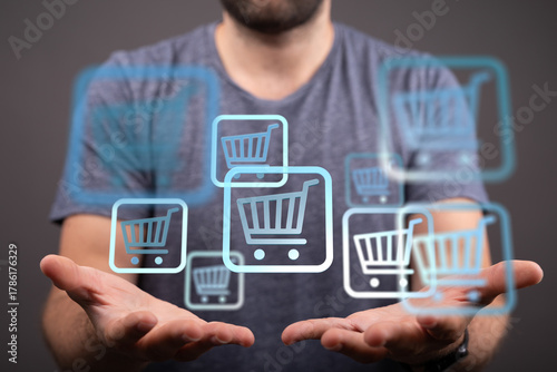 A person holding up shoppin...