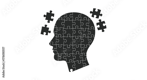 Silhouette of a human head formed by puzzle pieces with some pieces detached symbolizing thought process and ideas