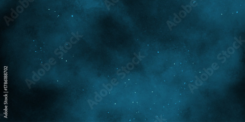 Blue powder dust smoke on black background. abstract background. Space of night sky with cloud and stars. Nebula and galaxies in space. Abstract cosmos background.