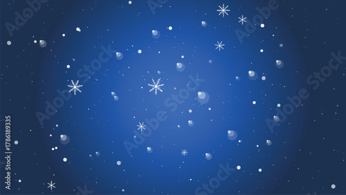 Snowflakes and snow dots falling on a dark blue winter night background