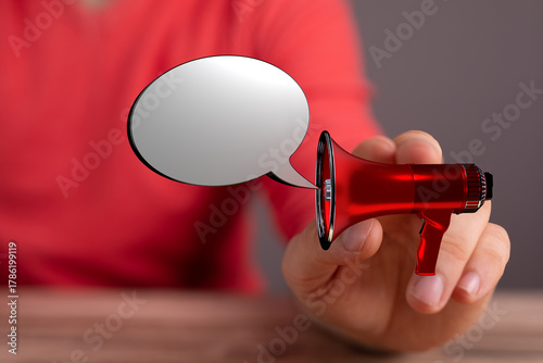 Image of a person holding a...
