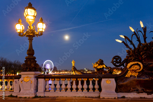 Panoramic view of Pont Alexandre III in Paris at night, France