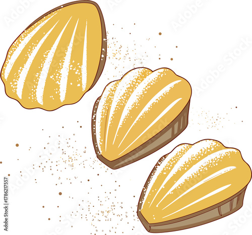 Three madeleines with powdered sugar
