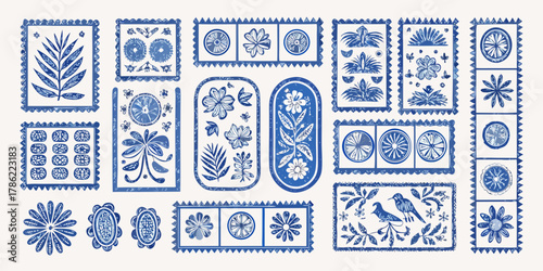 Collection of blue and white decorative elements featuring flowers leaves and birds in a folk art style