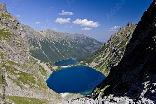 Fototapeta Naklejka Na Ścianę i Meble -  View of the mountain lakes Czarny Staw and Morskie Oko in the Rybiego Potoka Valley. Polskie Tatry. Poland. Europe.