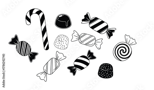 A variety of candies including a candy cane, wrapped sweets, and chocolates are scattered across a white background.