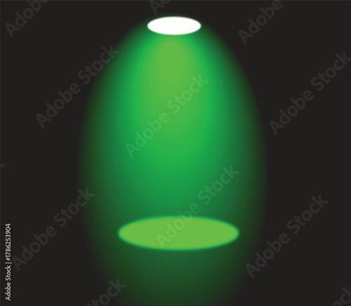 The image you described features a dark-colored object illuminated by a green spotlight from the top center, with bright spots at both the top and