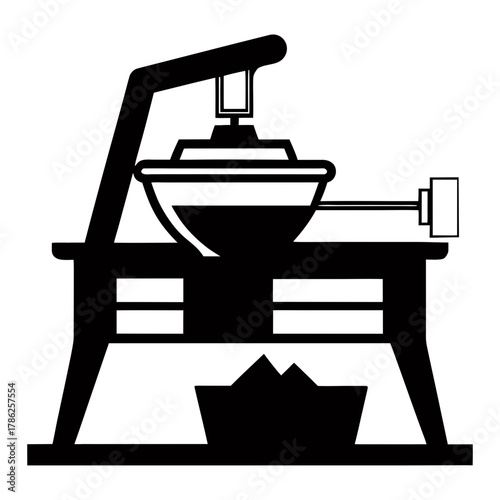 Vintage oil press machine in silhouette