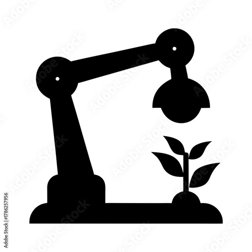 Robotic arm tending to a small plant silhouette