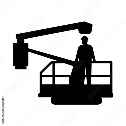 Construction worker in aerial lift bucket silhouette