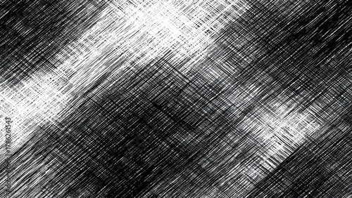 Abstract black and white cross-hatch texture creating a grunge pattern.