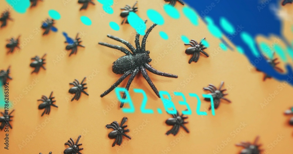 Naklejka premium Perching large glittery black spider on rounded orange prop, with small spiders and 92