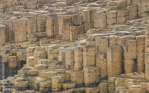 Basalt rock formations at the Giant’s Causeway, Northern Ireland – unique volcanic landscape and coastal geology”