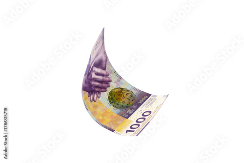 Flying Swiss money - the new issue of thousend francs note, isolated with clipping path