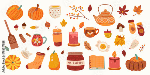 Cozy autumn collection of seasonal elements including pumpkins candles mugs and leaves