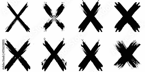 Collection of eight diverse black brush stroke letter x symbols on a white background