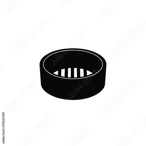 Black cylindrical object with white striped interior