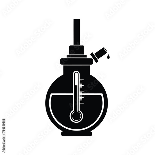 Black laboratory flask with thermometer and dripping liquid