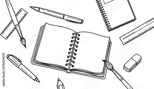 A collection of drawing and writing tools including pens, pencils, rulers, brushes, and notebooks.