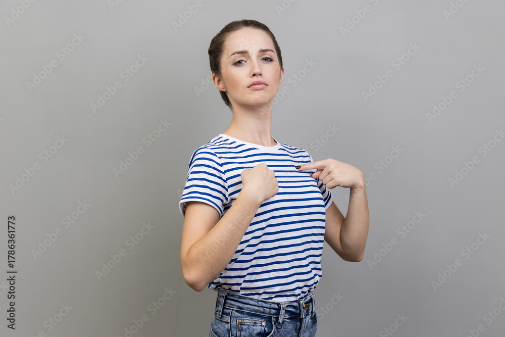 Φωτογραφία Self-confident narcissistic woman standing pointing herself, feeling self-important, proud, famous