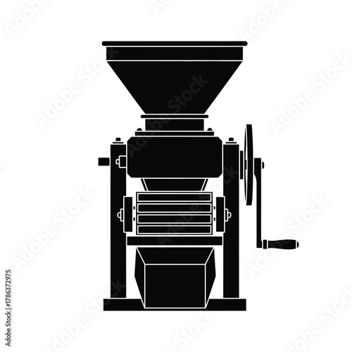 Black silhouette of a manual grain mill with hopper