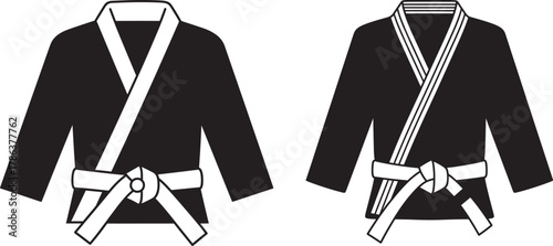 Two black gi uniforms silhouette
