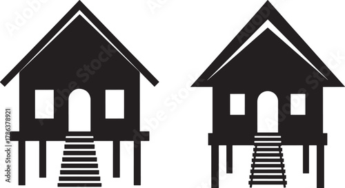 Two traditional stilt houses silhouette