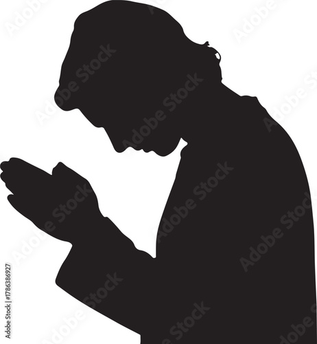 Silhouette of a man humbly holding hands in contemplative prayer with transparent backdrop