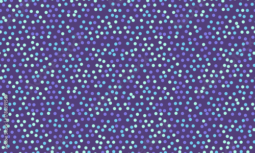 Abstract purple background with scattered light blue and purple dots.  Perfect for websites, textiles, packaging, and more.  This playful, confettilike pattern evokes joy and celebration.